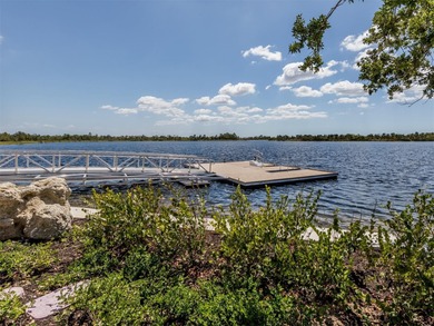 This meticulously maintained, WCI-built residence nestled in the on Sarasota National Golf Club in Florida - for sale on GolfHomes.com, golf home, golf lot