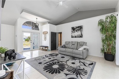 One of the BEST PRICED golf course pool homes in Royal Palm Golf on Eagle Lakes Golf Club in Florida - for sale on GolfHomes.com, golf home, golf lot