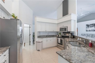 One of the BEST PRICED golf course pool homes in Royal Palm Golf on Eagle Lakes Golf Club in Florida - for sale on GolfHomes.com, golf home, golf lot