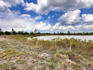 Stunning Waterfront Lot in Indian Lake Estates - Build Your on Indian Lake Estates Golf and Country Club in Florida - for sale on GolfHomes.com, golf home, golf lot