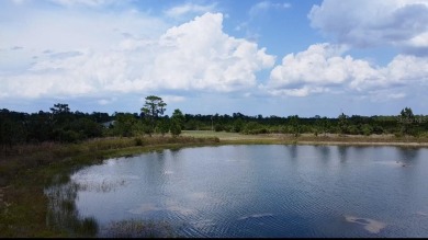 Stunning Waterfront Lot in Indian Lake Estates - Build Your on Indian Lake Estates Golf and Country Club in Florida - for sale on GolfHomes.com, golf home, golf lot
