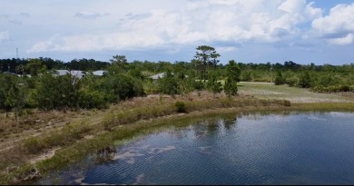 Stunning Waterfront Lot in Indian Lake Estates - Build Your on Indian Lake Estates Golf and Country Club in Florida - for sale on GolfHomes.com, golf home, golf lot