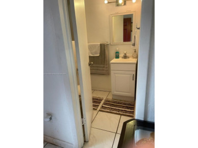 BEAUTIFUL 1 BEDROOM 1.5 BATHROOM SCREENED BALCONY WITH A on Presidential Estate Golf Course in Florida - for sale on GolfHomes.com, golf home, golf lot
