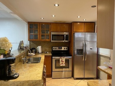 BEAUTIFUL 1 BEDROOM 1.5 BATHROOM SCREENED BALCONY WITH A on Presidential Estate Golf Course in Florida - for sale on GolfHomes.com, golf home, golf lot