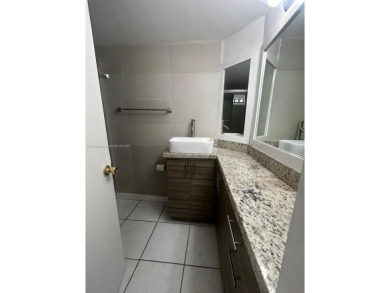 BEAUTIFUL 1 BEDROOM 1.5 BATHROOM SCREENED BALCONY WITH A on Presidential Estate Golf Course in Florida - for sale on GolfHomes.com, golf home, golf lot
