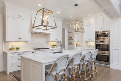Step into timeless elegance with this exquisite Waters-Holland on The Champions Club At Hampton Creek in Tennessee - for sale on GolfHomes.com, golf home, golf lot