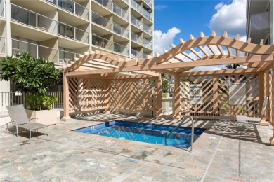Experience island living at its finest in this beautifully on Ala Wai Golf Course in Hawaii - for sale on GolfHomes.com, golf home, golf lot