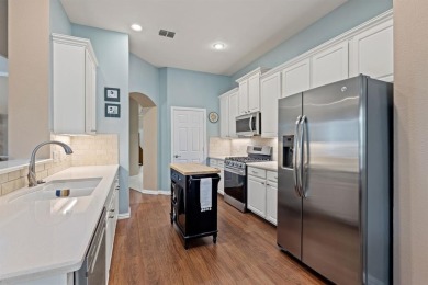 KITCHEN & PRIMARY BATH RENOVATED. UPDATED TRAVIS FLOOR PLAN IN on Heritage Ranch Golf and Country Club in Texas - for sale on GolfHomes.com, golf home, golf lot