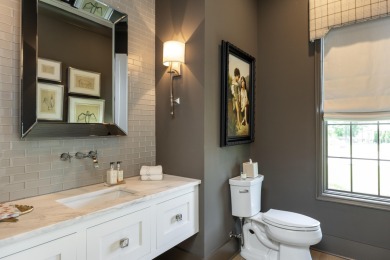 Step into timeless elegance with this exquisite Waters-Holland on The Champions Club At Hampton Creek in Tennessee - for sale on GolfHomes.com, golf home, golf lot