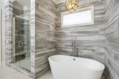 Step into timeless elegance with this exquisite Waters-Holland on The Champions Club At Hampton Creek in Tennessee - for sale on GolfHomes.com, golf home, golf lot