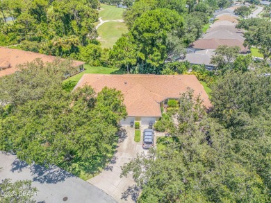 Welcome to easy, maintenance-free living in this charming on Turnbull Bay Golf Club in Florida - for sale on GolfHomes.com, golf home, golf lot