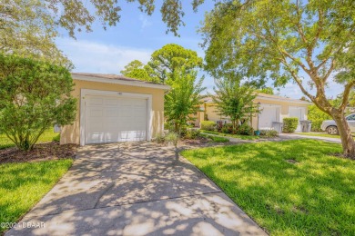 Welcome to easy, maintenance-free living in this charming on Turnbull Bay Golf Club in Florida - for sale on GolfHomes.com, golf home, golf lot