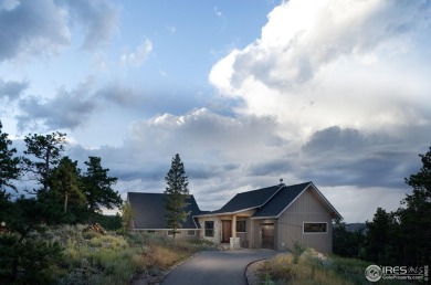 Welcome to your serene retreat in the picturesque Fox Acres golf on Fox Acres Country Club in Colorado - for sale on GolfHomes.com, golf home, golf lot