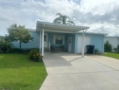 This1998 Nobility home has  two bedrooms and  two bathrooms on on Four Lakes Golf Club in Florida - for sale on GolfHomes.com, golf home, golf lot