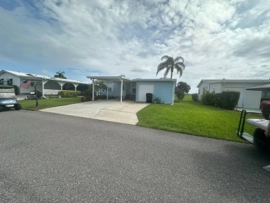 This1998 Nobility home has  two bedrooms and  two bathrooms on on Four Lakes Golf Club in Florida - for sale on GolfHomes.com, golf home, golf lot