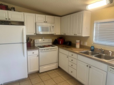 This1998 Nobility home has  two bedrooms and  two bathrooms on on Four Lakes Golf Club in Florida - for sale on GolfHomes.com, golf home, golf lot