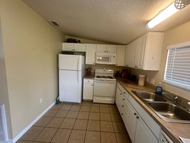 This1998 Nobility home has  two bedrooms and  two bathrooms on on Four Lakes Golf Club in Florida - for sale on GolfHomes.com, golf home, golf lot