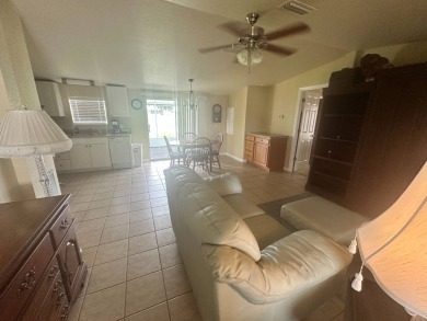 This1998 Nobility home has  two bedrooms and  two bathrooms on on Four Lakes Golf Club in Florida - for sale on GolfHomes.com, golf home, golf lot