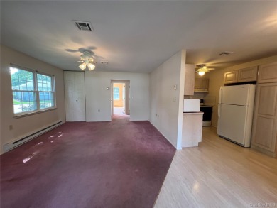 Great location. Corner unit Greenbriar Model with heated and on Leisure Village Golf Course in New York - for sale on GolfHomes.com, golf home, golf lot