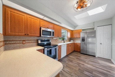 One or more photo(s) has been virtually staged. Beautifully on Stonecrest Golf and Club Club in Florida - for sale on GolfHomes.com, golf home, golf lot