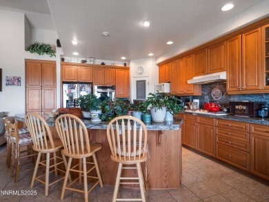 Offered for the first time, this custom home at 1037 Haystack on Sun Ridge Golf Course in Nevada - for sale on GolfHomes.com, golf home, golf lot