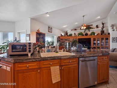 Offered for the first time, this custom home at 1037 Haystack on Sun Ridge Golf Course in Nevada - for sale on GolfHomes.com, golf home, golf lot