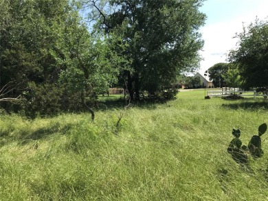 Nearly 1 AC sitting across from the Old Course Driving Range and on White Bluff Resort - Old Course in Texas - for sale on GolfHomes.com, golf home, golf lot