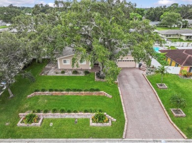 Welcome to this beautifully maintained home in the sought-after on The Dunedin Country Club in Florida - for sale on GolfHomes.com, golf home, golf lot