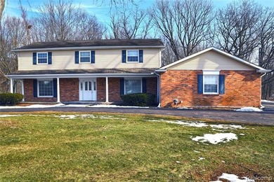 This beautiful brick home in Warwick Hills Golf Community offers on Warwick Hills Golf and Country Club in Michigan - for sale on GolfHomes.com, golf home, golf lot