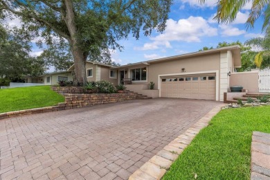 Welcome to this beautifully maintained home in the sought-after on The Dunedin Country Club in Florida - for sale on GolfHomes.com, golf home, golf lot