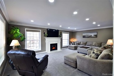 This beautiful brick home in Warwick Hills Golf Community offers on Warwick Hills Golf and Country Club in Michigan - for sale on GolfHomes.com, golf home, golf lot