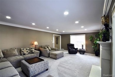 This beautiful brick home in Warwick Hills Golf Community offers on Warwick Hills Golf and Country Club in Michigan - for sale on GolfHomes.com, golf home, golf lot