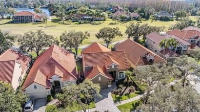 Welcome to this EXQUISITE CUSTOM-DESIGNED home situated within on Cheval Golf and Country Club in Florida - for sale on GolfHomes.com, golf home, golf lot