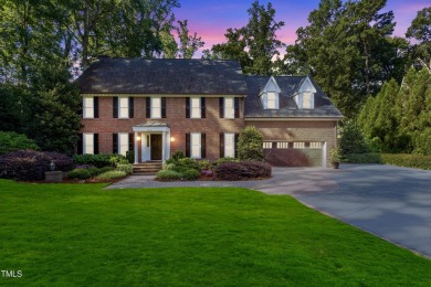 Exquisite traditional brick estate in the prestigious North on North Ridge Country Club in North Carolina - for sale on GolfHomes.com, golf home, golf lot