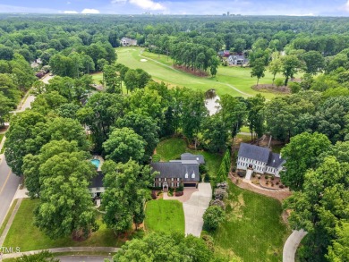 Exquisite traditional brick estate in the prestigious North on North Ridge Country Club in North Carolina - for sale on GolfHomes.com, golf home, golf lot