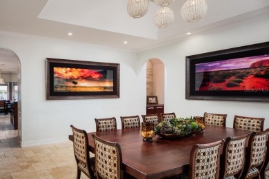 Experience refined lakefront living in this exceptional estate on Isleworth Golf and Country Club in Florida - for sale on GolfHomes.com, golf home, golf lot