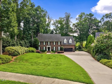 Exquisite traditional brick estate in the prestigious North on North Ridge Country Club in North Carolina - for sale on GolfHomes.com, golf home, golf lot