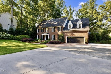 Exquisite traditional brick estate in the prestigious North on North Ridge Country Club in North Carolina - for sale on GolfHomes.com, golf home, golf lot