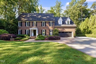 Exquisite traditional brick estate in the prestigious North on North Ridge Country Club in North Carolina - for sale on GolfHomes.com, golf home, golf lot