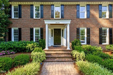 Exquisite traditional brick estate in the prestigious North on North Ridge Country Club in North Carolina - for sale on GolfHomes.com, golf home, golf lot
