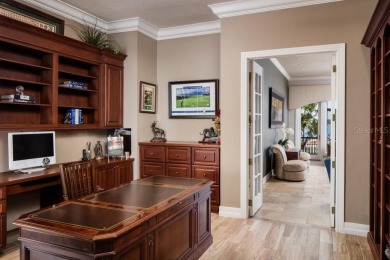 Experience refined lakefront living in this exceptional estate on Isleworth Golf and Country Club in Florida - for sale on GolfHomes.com, golf home, golf lot