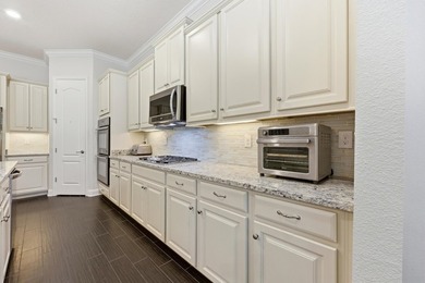 Tucked Along A Quiet Street In The Highly Sought After Community on The Palencia Club in Florida - for sale on GolfHomes.com, golf home, golf lot