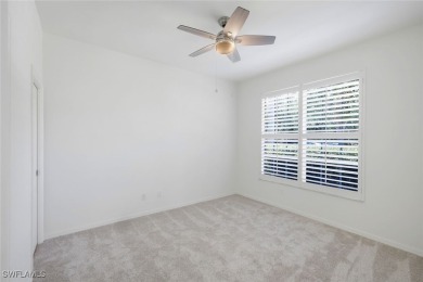 Welcome home to this beautiful and bright first-floor, corner on Spanish Wells Golf and Country Club in Florida - for sale on GolfHomes.com, golf home, golf lot