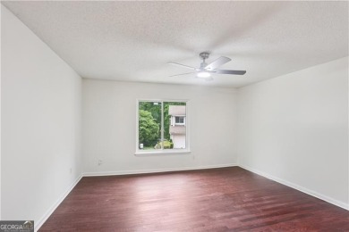 Welcome to this spacious and versatile end-unit townhome in the on Indian Hills Country Club in Georgia - for sale on GolfHomes.com, golf home, golf lot