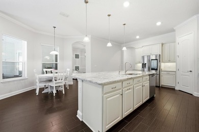 Tucked Along A Quiet Street In The Highly Sought After Community on The Palencia Club in Florida - for sale on GolfHomes.com, golf home, golf lot