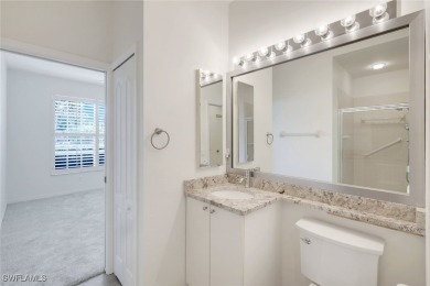 Welcome home to this beautiful and bright first-floor, corner on Spanish Wells Golf and Country Club in Florida - for sale on GolfHomes.com, golf home, golf lot