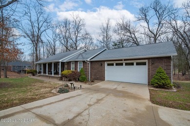 Welcome to this spacious custom built ranch home in the private on Doe Valley Country Club in Kentucky - for sale on GolfHomes.com, golf home, golf lot