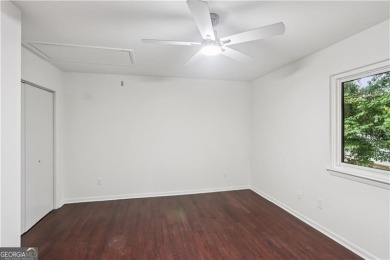 Welcome to this spacious and versatile end-unit townhome in the on Indian Hills Country Club in Georgia - for sale on GolfHomes.com, golf home, golf lot