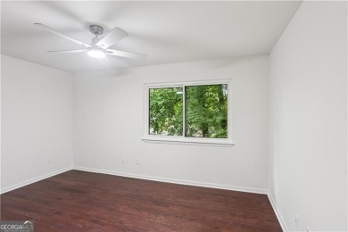 Welcome to this spacious and versatile end-unit townhome in the on Indian Hills Country Club in Georgia - for sale on GolfHomes.com, golf home, golf lot
