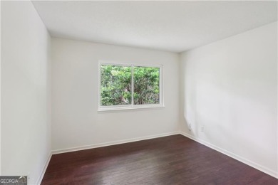 Welcome to this spacious and versatile end-unit townhome in the on Indian Hills Country Club in Georgia - for sale on GolfHomes.com, golf home, golf lot